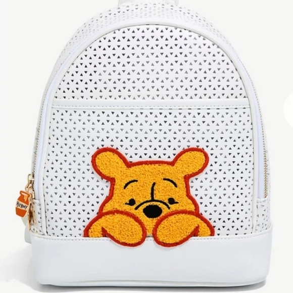 Disney Handbags - NWT Winnie the Pooh perforated backpack